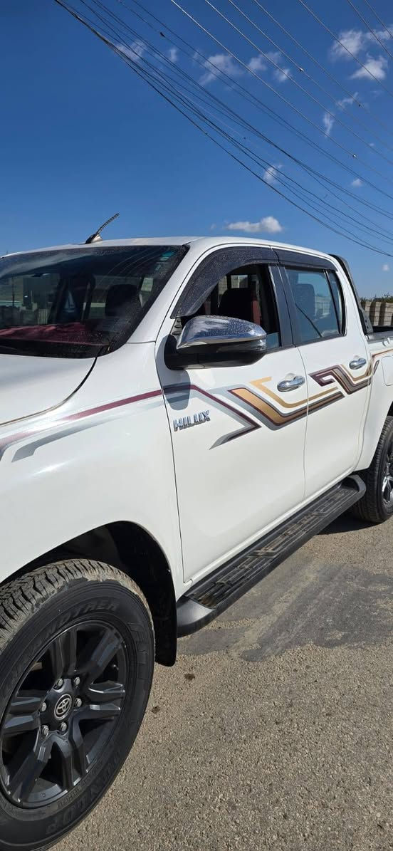 تويوتا هايلوكس فور ويل ٤ سلندر رقم بغداد موديل ٢٠٢١ كفاله عامه ماشيه ٤٨ الف كيلو حقيقي فول مواصفات ساز ..مكانها..الرمادي...للاستفسار..    ***********
