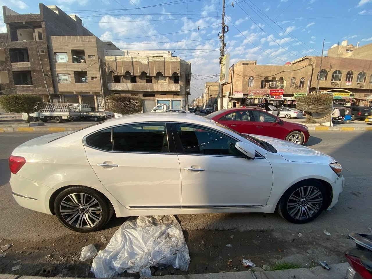 كيا كادينزا 2014
وارد أمريكي فول عدا بانوراما 
بيهه صبغ حزام 
 مكاني بغداد حي العدل 
***********
115 ورقه وبيهه مجال
