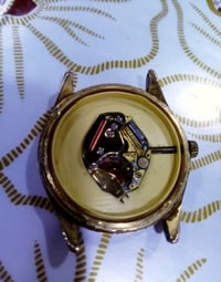 ساعة مطلية • مكينة سويسري
