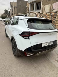 للبيع السعر 245 كيا سبورتج 2025  بلاك ادشن  رقم بغداد الجديد  باسمي تح...