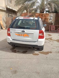 للبيع كيه سبورتج 2009 مكينه 2000  رقم بغداد جديد بأسمي سنويه ل2030  سي...