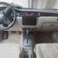 لانسر تكسي للبيع رقم ذي،قار سمكرة وصبغ  مع تخم تاير وباتر جديدة محرك ك...