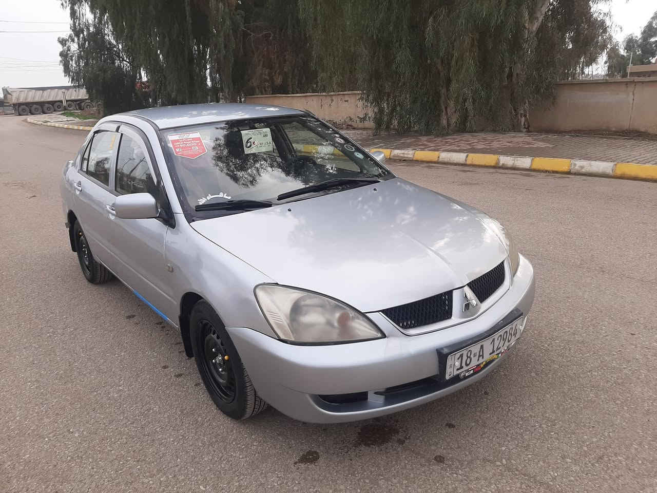 سلام عليكم لانسر ٢٠٠٦ رقم بابل انكليزي بسمي مشروع وطني مكينة 1600 قبق اسود كير مكينة شاشه كامره مكفولات جدد تبريد تدفئة شغال حدادية خير من الله سيارة  جديدة احلة من صور ستفسار ((***********)) ( السعر 58 وبيهة مجال سيارة كاملة مابيهة اي نقص مصبوغه عام جماليه فقط سيارة جديدة جديدة مكان سيارة ديالئ السلام
