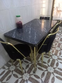ميز ست كراسي • طاولة سفرة