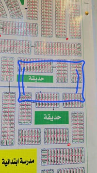200 م بالعتبه تجاريه على شارع 30 وحديقه باسمي قطاع 64 07749355893