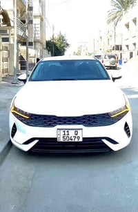 كيا K5 2023 LXS  مرقم بغداد بإسمي  للبيع  المواصفات :  • محرك 1600 تير...