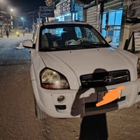 توسان موديل ٢٠٠٩ خليجي رقم نجف بيه قطعتين 07841099140 103$$