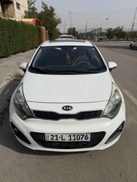 كيا ريو هاك باك  موديل  2014  رقم سليمانيه  ماشيه 85  مري شفط و فتحه م...