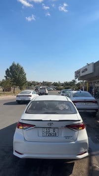 كورلا 2024 هايبرد مكفوله ماشيه 33 الف كيلو تحويل مباشر بغداد السيديه ا...