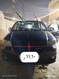 دوج كرفان موديل 2014 للبيع رقم بغداد انكليزي تحويل مباشر  وارد امريكي ...