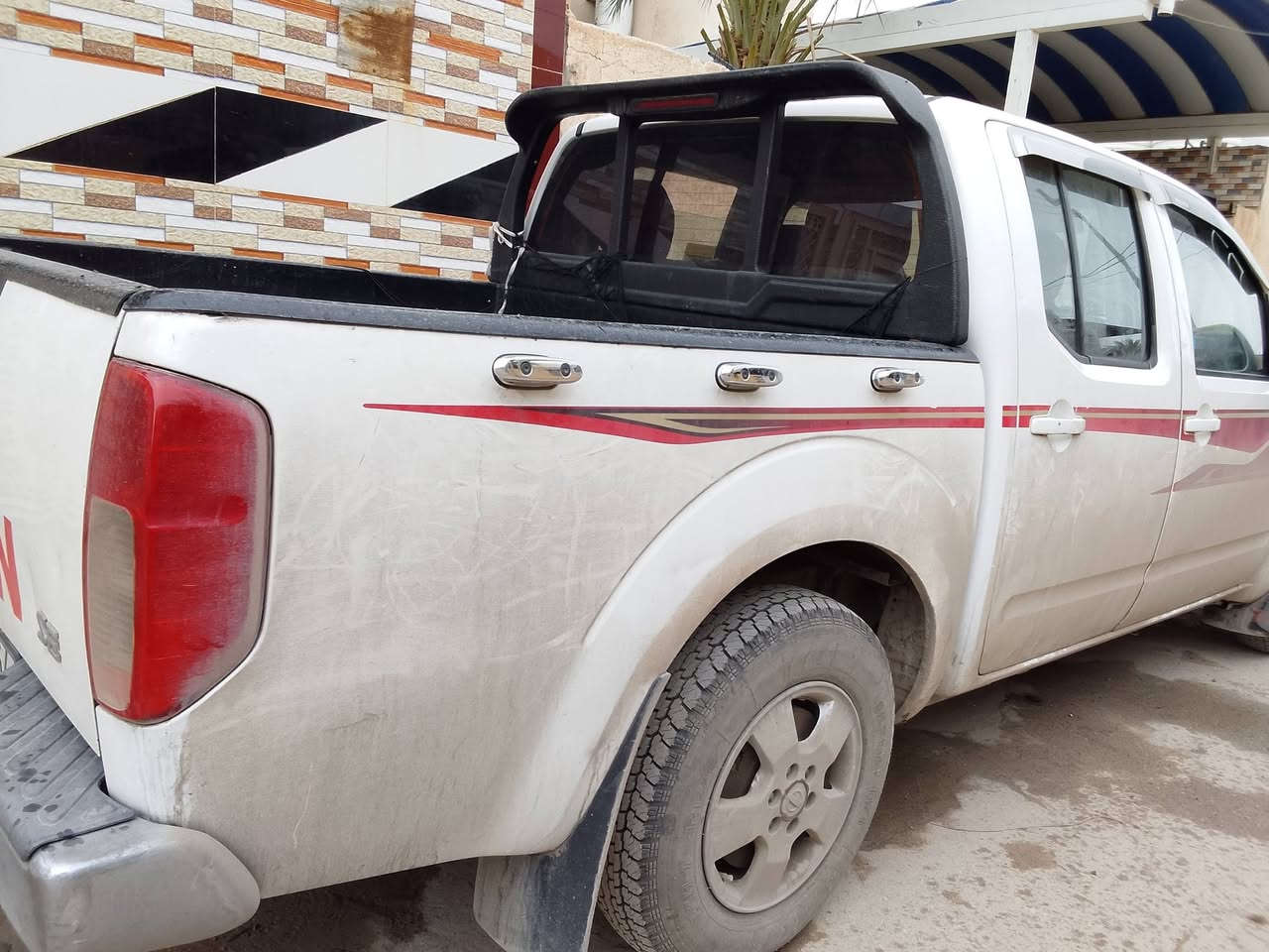 نيسان نيفارا 2009 سليمانية باسمي بدون صبغ فقط بارد السيارة جاهزة *********** واتساب السعر 97 مراوس
