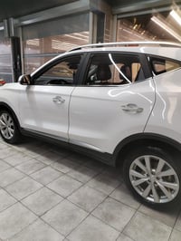 Mg zs للبيع موديل ٢٠٢٢ فول ماعدى الفتحة  بصمة داخل جلد احمر رقم بغداد ...