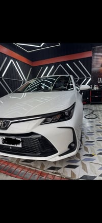 كورلا هايبرد 2024 مكفوله كفاله عامه فول مواصفات  ماشيه 7000km رقم بغدا...