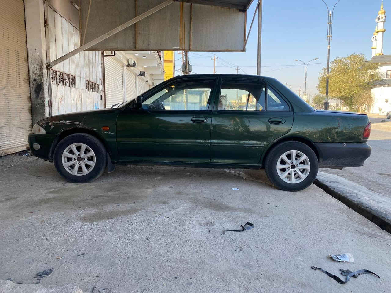 بروتون موديل 2002 رقم كركوك كير عادي 
سنه ويه عاج شرت تحويل أو وكاله 
شرت قرص ول اضباره بدون غرامه 
دفتر بنزين موجود محرك كير صدر تبريد 
تايرات كله بشرت صعر 38 بي مجال عشرايي 
***********
*********** كركوك, العراق
