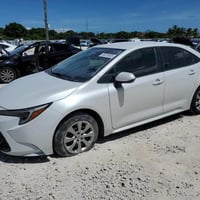 السلام وعليكم كورلا هايبرد وارد امريكي 2024ابيض رقم بغداد حادتثها موضح...