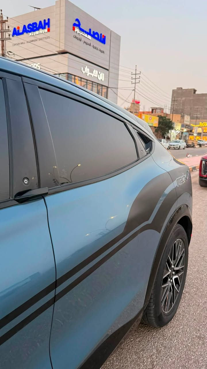 مراوس فقط حسب القناعة 2024
‏ FORD MUSTANG MACH-E Premium X
فورد موستنك ماك-اي
‏بريموم X
تكون اعلى فئة 
تمشي بالشحنة الكاملة 480 كيلو
‏Full Electric 
 كهربائية بالكامل

السيارة بحالة الوكالة ماشية 15 مايل فقط
حادثها بيبان ثنين مبدلات اصليات ومصبوغات
السيارة على وضع الوكالة استيراد شخص واحد
بطارية ليثيوم أيون
 البطارية جبيره
مداخل شحن (AC/DC)
مرقم بغداد بأسمي مداور ثاني يوم
المواصفات : بصمة فتح وتشغيل/ مثبت سرعة/  ترحيب /انارة محطية 12 لون/
شاشة بحجم 15,5 بوصة/ 3أنظمة قيادة/ Navigation / أضوية زنون/ كشافات ضباب LED/ غمازات على المري/ مري كهرباء/ بلوتوث/ سنتر لوك/ زجاج كهربائي (Full Auto)/ مثبت سرعة/  4 بصمات
بانوراما |panorama view 
شاشة تدعم اللغة العربية | Arabic screen 
حساسات أمامية وخلفية | Front & Back sensors 
تحكم طارة  | control wheel
صندوق كهربائي | Electric Back Door 
انارة داخلية مخفية | Concealed interior lighti
كاميرات محيطية 360 | cameras 360 
رادار تفاعلي ذكي | Adaptive cruise control 
كراسي جلد | Leather seats 
كرسي مدفأ | Heated seat
كرسي كهربائي | Electric seat
كرسي ذاكرة | memory seat
نقط عمياء | Blind spot 
مري جانبية قابلة للطي | Foldable side mirror
شاحن لاسلكي | wireless charger 
‏B&O sound system | نظام صوتي B&O
‏Apple CarPlay 
‏Android Auto 
***********
متواجد واتساب

