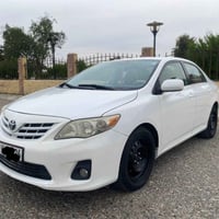 كورلا 2013 كندي رقم أربيل بأسمي كوبون بانزين بي  للأتصال 07764899350