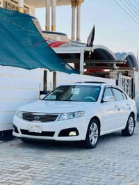 اوبتما • ٢٠١٠ • مكينه ٢٠٠٠