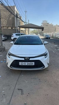 كورلا هايبرد 2024 شكل امريكي ماشية 34كم  كشنات جلد  كراسي كهرباء  رادا...