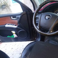 سبورتاج V6 • ٢٠٠٩ • جلد فتحة