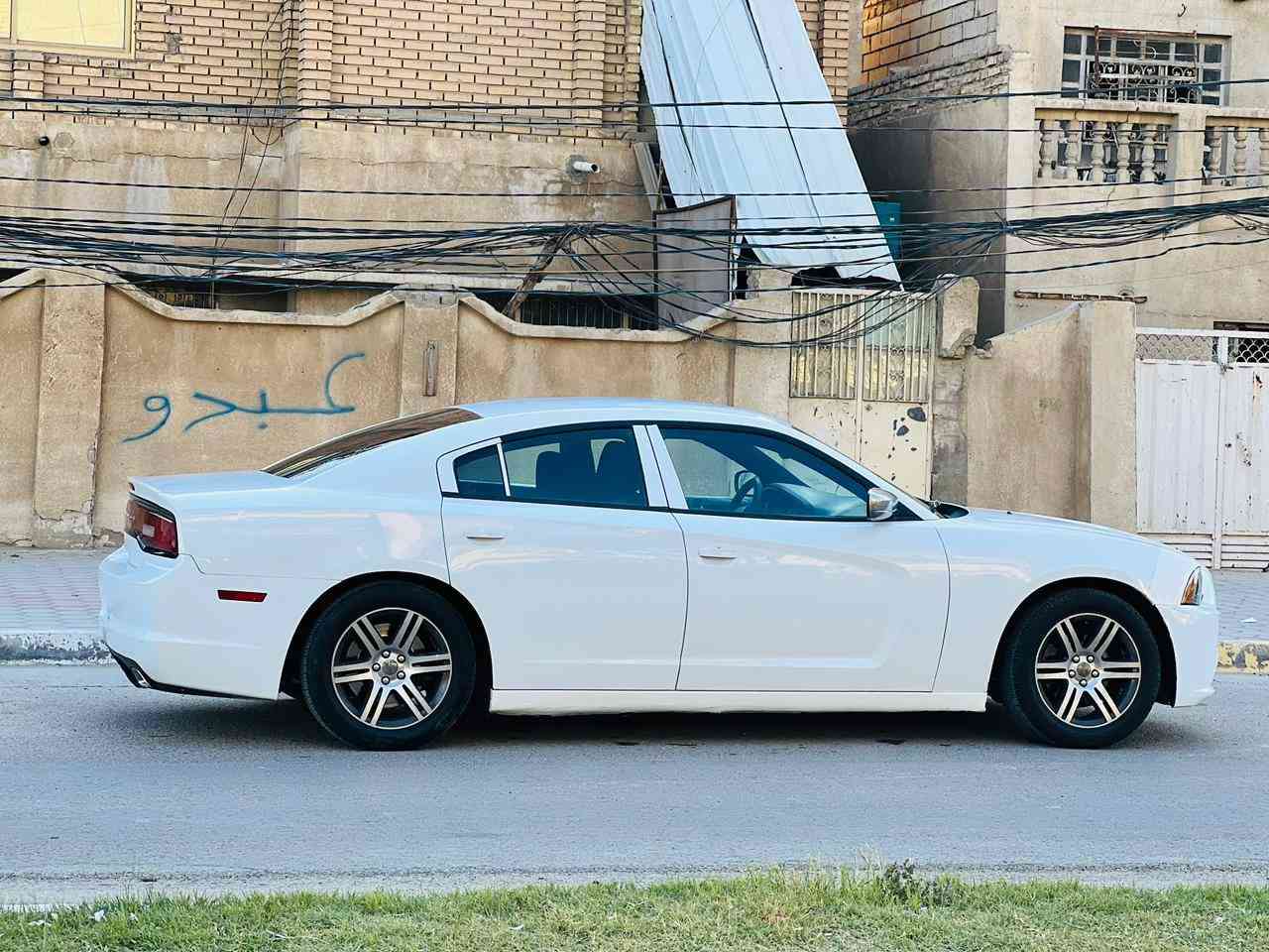 جارجر مديل 2012 ب اسمي سعر 148 قابل للتفاوض الاستفسار اتصل ***********كفاله عامه ضربه وصبغ وتبديل مكفوله من كلشي مواصفات شاشه كبيره تحكم ستيرن كامره خلفيه دواره بصمه تشغيل بصمه أبواب تشغيل عن بعد قطعتين تبريد حساسات امامي وخلفي مكينه 3600 مكينه وكير مكفولات حداديه جديده تخم تاير تبريد تدفئه شغال مشروع وطني ب اسمي  سنويه ل 31 مكان سياره كربلاء
