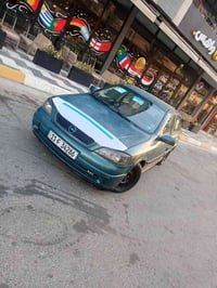 ياالله سلام عليكم للبيع اوبل استرا موديل 2002 رقم بغداد انكليزي شرط ال...