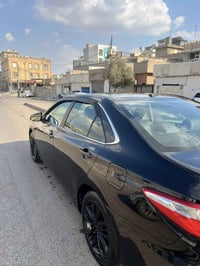 Camry 2016 black SE کامری ٢٠١٦  SE دوو پارچە بۆیاخ بێ ناو بێ ئەیرباگ س...