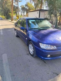 من رخصة الأدمن المحترم للبيع بيجو 306 موديل 2001 بغداد سياره كامله فقط...