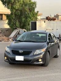 كورلا 2009 امريكية  ماشية 123 مكينه 1800  هزه ورقم جديد باسمي  مصبوغه ...