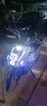 دراجة شحن اخت الجديدة  ملف 2000 بدون بطاريات  سرعة 100  سعرها 575 الف ...