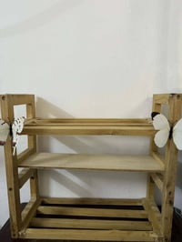 كاونتر • رف خشب • جهاز ليزر