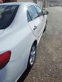 كورلا ٢٠٠٨ رقم نينوى دولي بأسمي بيها جاملغ جهة السائق الأمامي تعديل با...