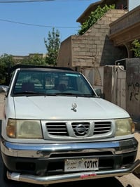 نيسان تاك • ٢٠٠٢ • داربنديهكان