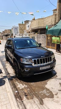 جيب موديل 2012وارد امريكي حادث جاملغ وبنيد فقط صبغ بدون دواخل  رقم بغد...