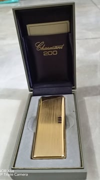 مجموعة قداحات • ماركة • ساعة توقيت عالمية