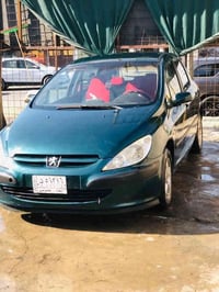 بيجو 307 فرنسي  موديل 2005 رقم بغداد مشروع وطني صاحبها بكركوك شرط التح...