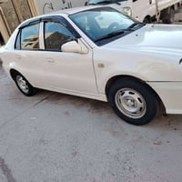 2013 ck السعر ٤١  نينوئ كابون بانزين شرط التحويل  بيها قطعتين صبغ وباب...