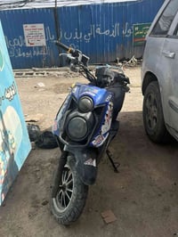 سكنس جبلي 6 بطاريات ملف 2000 تقطع مسافة 50 كيلو للشحنة سرعة 60-70 بيها...