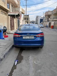 سيارة فورد فيوجن 2017  رقم سليمانية  حادث سرقة جاملغ  وبيها طخه بالباب...