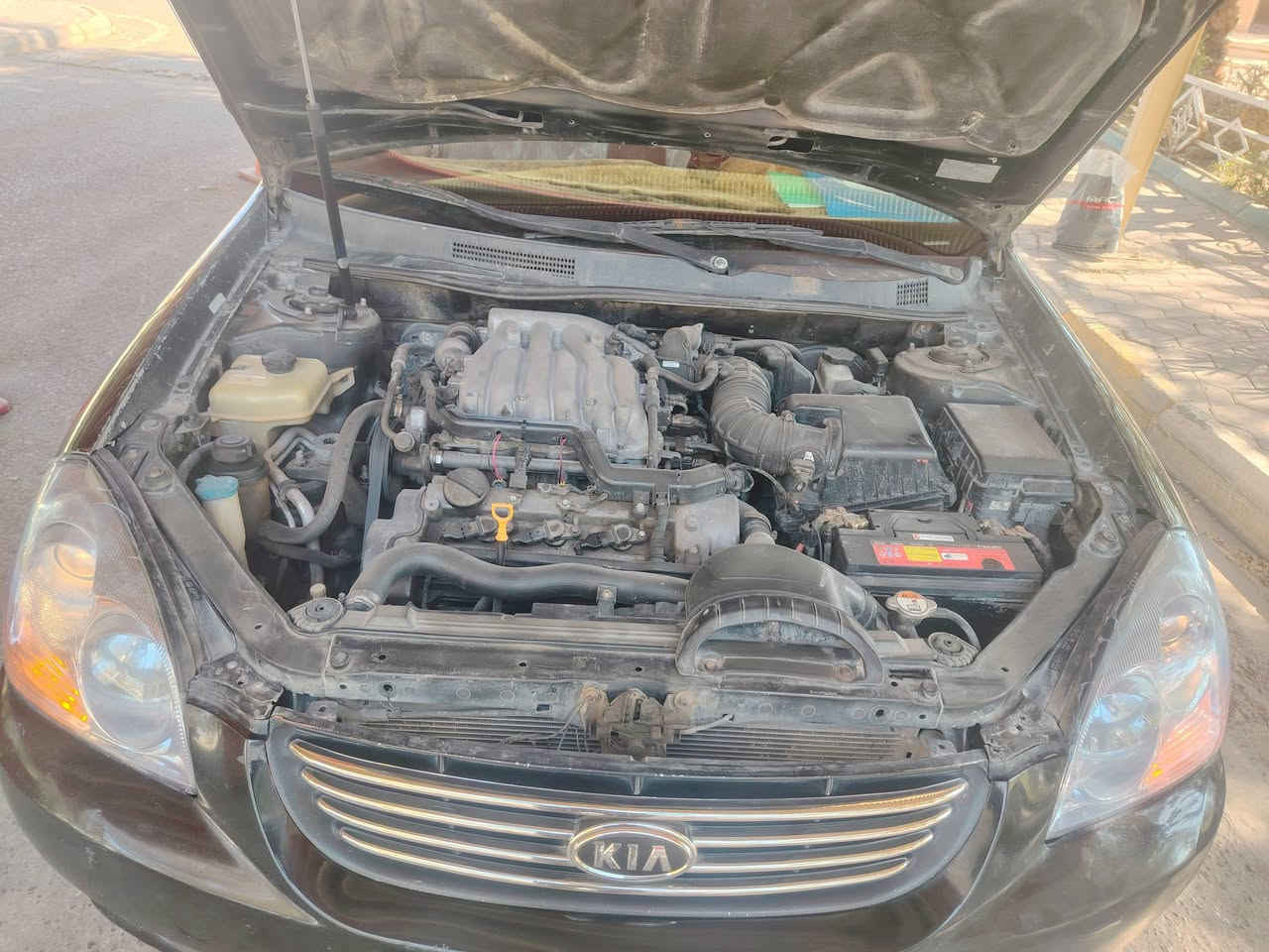 السلام عليكم ورحمة الله وبركاتة كيا اوبتيمة موديل 2006بسمي مشروع وطني هزة ورقم جديد مكينة وكير وحدادية وتخم تيارات تدفة تبريد خير من الله  المكينة //6//2700///مصبوغة حزام السعر المطلوب 85$$$$  العنوان واسط نعمانية رقم *********** وبي واتساب @ترهم امراوس حاسب القناعة  اسف على الطالة
