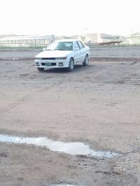 ميتسوبيشي لانسر • بدون صبغ • محرك يحتاج تجفيت