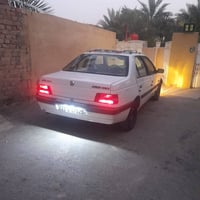بيجو جيلكس • بيجو GLX • بيجو 2009 • سيارة بيجو • جيلكس ابيض • رقم بغدا...