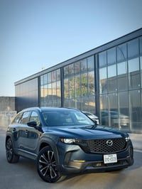 CX50 بريميوم • ماشيه ١٠ الف • ضرر خفيف