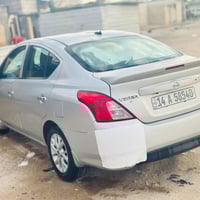 نيسان فيرسه مديل ١٨ بيه تلث قطع تبديل جاملغ وبنيدوباب سياره باسمي جاهز...