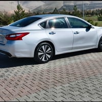 ألتيما موديل 2016 صبغ حزام حادثها خفيف ربع بونيد و اقل وباب السائق و ا...