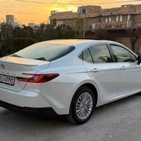 تۆیۆتا کامری  2025 مانكي ١٠ فول LE  شه ريكه ي ساز زه ماني هه شت سال  د...