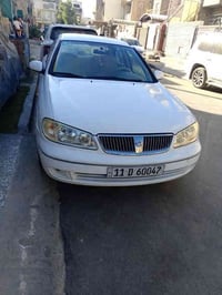 نيسان سني 2009 ياباني  سياره كفاله عامه من صبغ وتبديل ماشيه 112 الف كي...