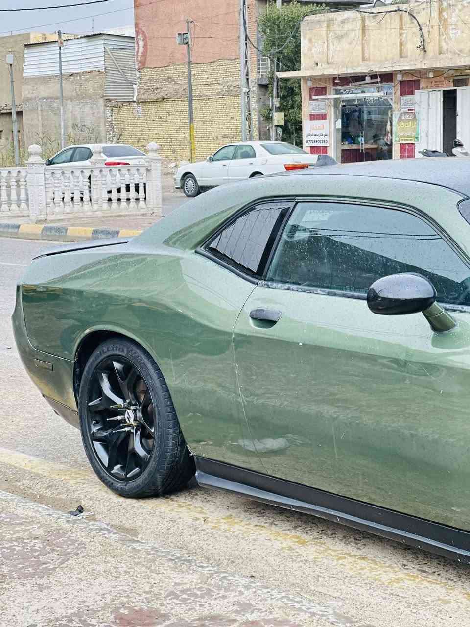 سلام عليكم ورحمة وبركاته سياره نوع جالنجر موديل 2014 اصل سياره صبغ عام تغير لون سنويه اخضر غير محدد مكينه 3600 كير مكينه بشرط سياره برمجه كلش حلوه نواقص لي بيهه ترتيب عربانه لخلفيه شوي ترتيبات بيهه فقط تحويل ثاني يوم غرامات عليه شيطلع عليه مكاني واسط كوت مركز مدينه سعر 110 بيهه مجال للستفسار اتصال ***********  رجاء لمو شراي لا يتعبنه لشراي يشلع عيوني واسف على الطاله
