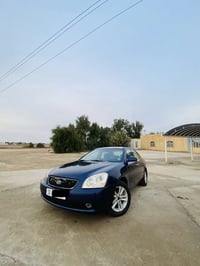 اوبتيما • مكينة ٢٤٠٠ • حادث امامي