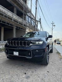 بيع مستعجل ارخص جيب بل عراق  جيب كراند شيروكي اوفر لاند فول موصفات بدو...